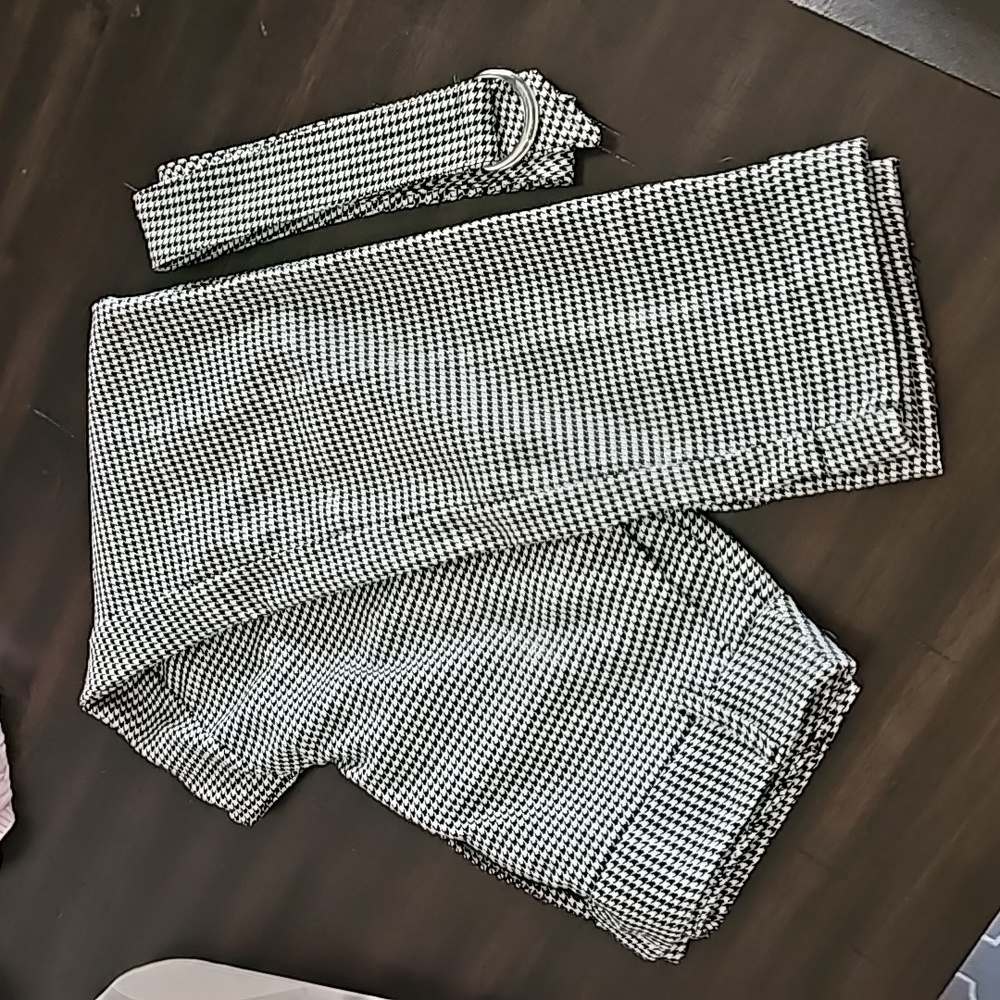 Very loved. INC waist high pants with belt. Functioning front pockets. Size 2.